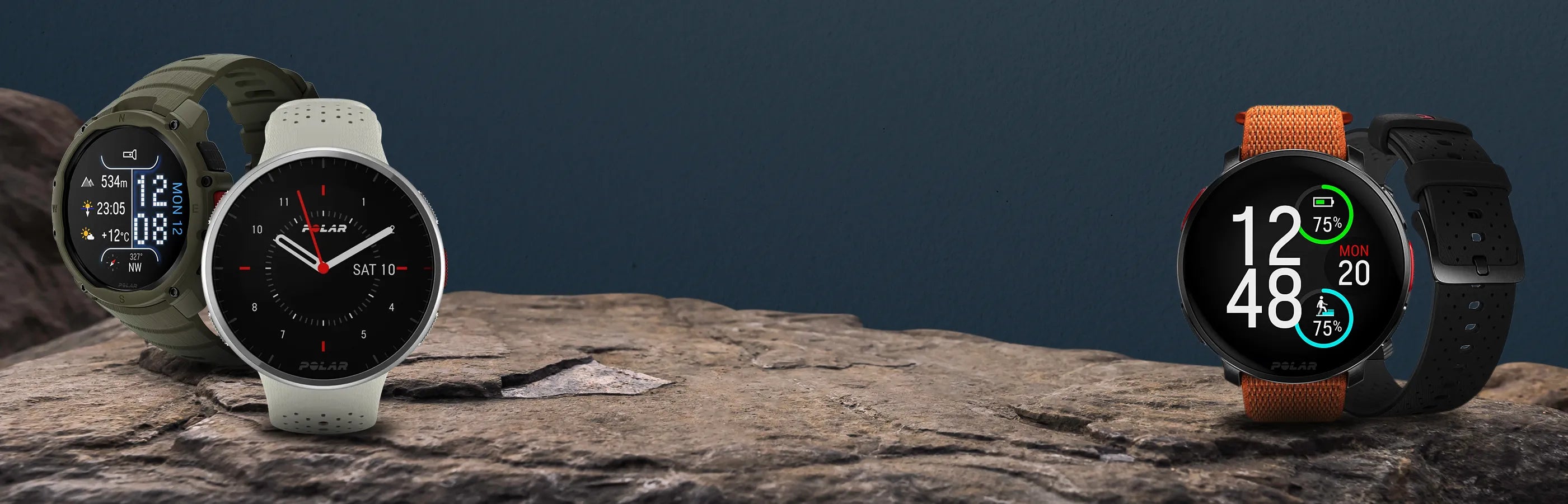 Four smartwatches displayed on a rock with a dark background for product showcase | Polar Philippines